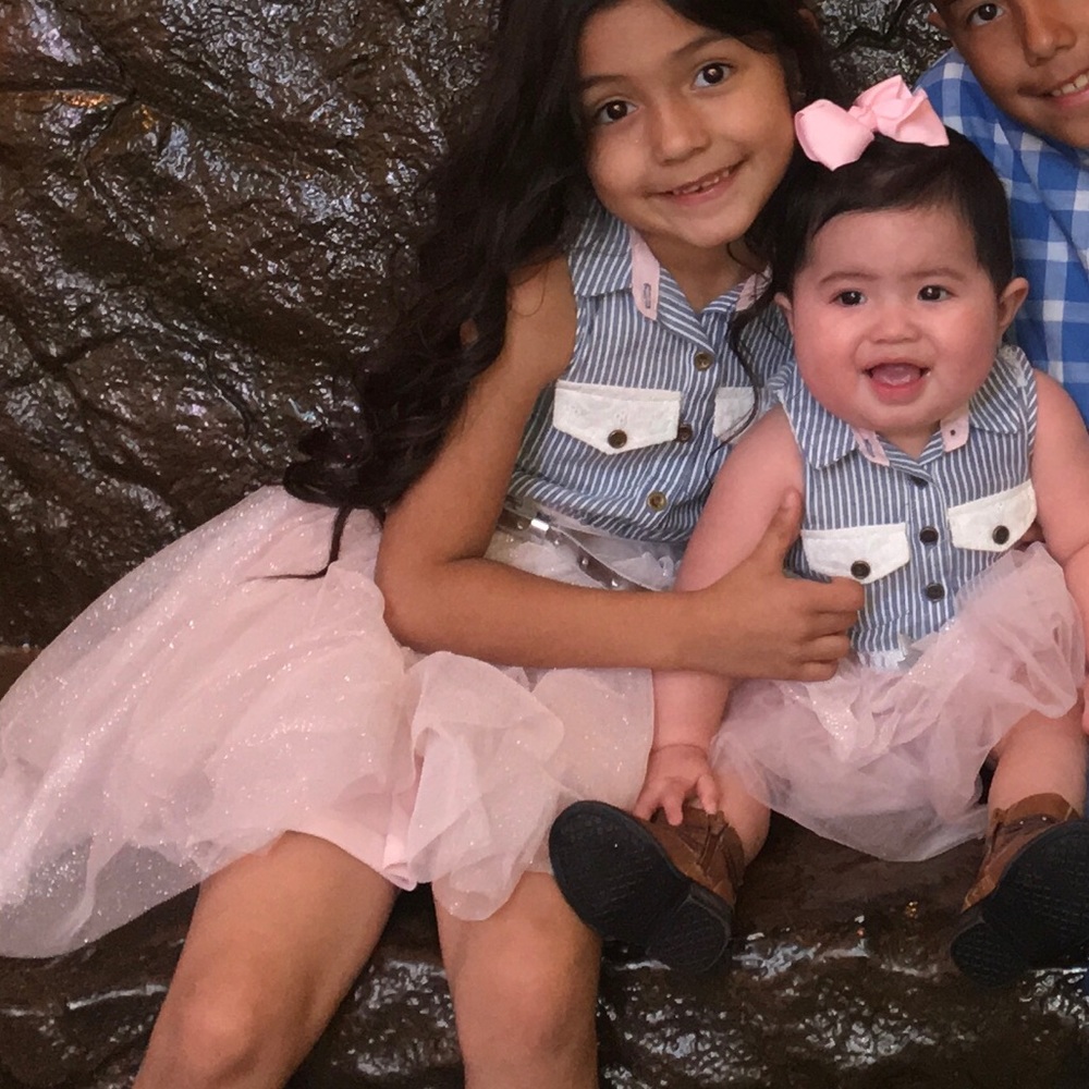 Dresses size 12 months and the other size 6 girls